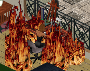 Maria at a computer on fire
