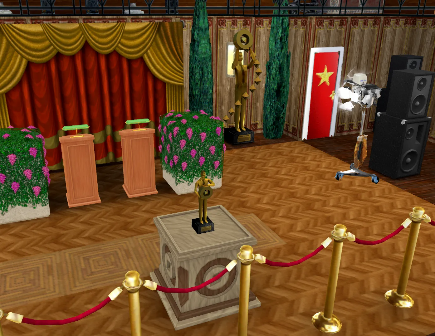 A Rhysie on a podium on stage at Sunrise Crater Town Hall roped off by velvet rope
